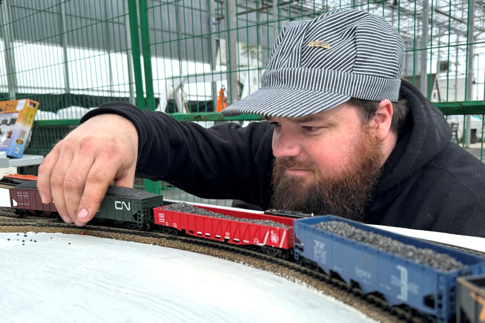 Benjamin Moore, of Barrie, runs a railway track at the 52nd Model Train Show held at Bradford Greenhouses in Barrie, hosted by the Barrie Allendale Railway Modellers club, on Feb. 17, 2024.