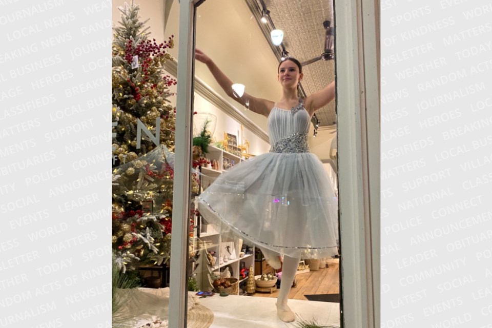 Fleet-Wood dancers perform in downtown store windows during the 2023 Christmas market. 