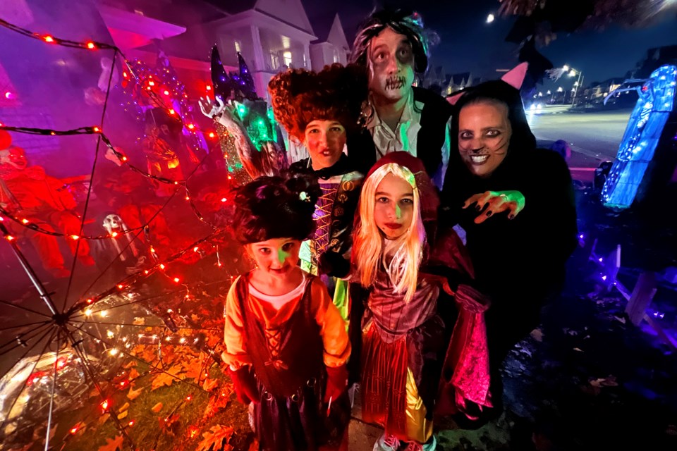 The Clark family, who were touring the different Halloween houses in Barrie on Saturday night, fit right in among the scary creatures at 69/71 The Queensway. 