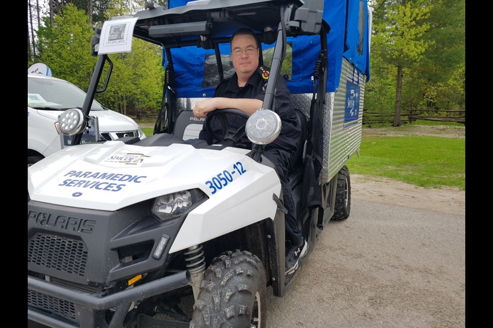 Shane Smith shows off the UTV that helps get paramedics to hard-to-reach patients, June 1, 2019. Shawn Gibson/BarrieToday