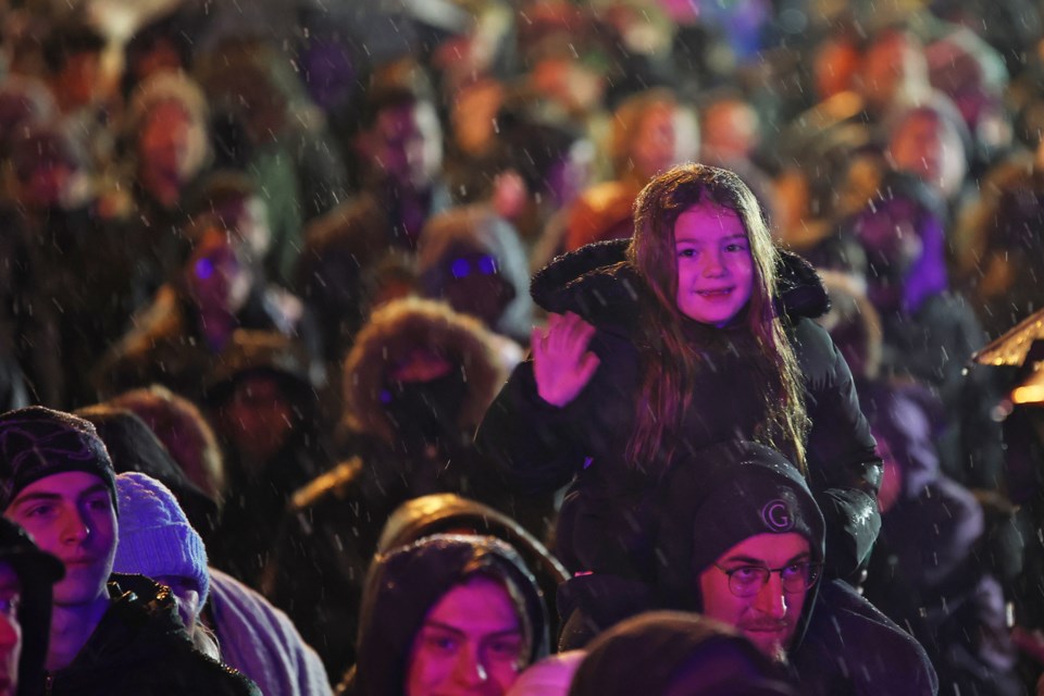 Revellers party as the city rang in 2025 on New Year's Eve in downtown Barrie.