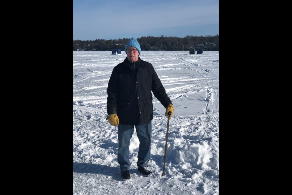 Doug Suter gets ready to fish in Lake Simcoe's ice covered water in early March. Submitted photo