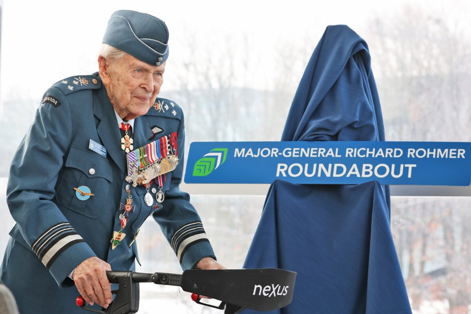 Retired Maj.-Gen. Richard Rohmer, who's 100 years old, a Second World War fighter pilot who wrote himself into history by helping eliminate The Desert Fox, Germany's Field Marshall Erwin Rommel from the Battle of Normandy, had a roundabout named after him at Georgian College's Barrie campus on Dec. 3.