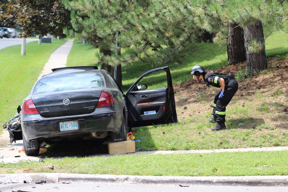 Three people rushed to hospital following two-vehicle crash