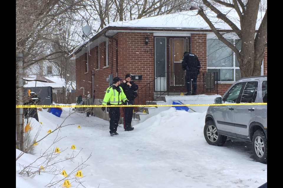 Barrie Police process a second scene on Marcus Street in relation to the overnight double murder on William Street.
Yellow markers lead up the driveway to the front step where there is blood visible on the door.
Sue Sgambati/BarrieToday