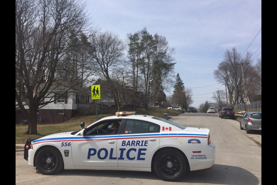 There is a heavy police presence at Gunn Street and Berczy Street as officers investigate a shooting. Sue Sgambati/BarrieToday