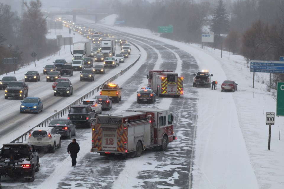 Highway 400 southbound is backed up south of the Bayfield Street exit in Barrie around 4:30 p.m. as emergency crews tend to a reported vehicle fire. Raymond Bowe/BarrieToday 