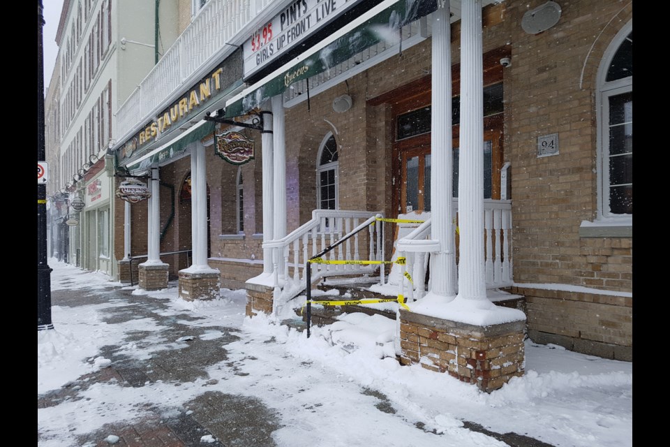 Police tape blocks the entrance to the Queen's Hotel in downtown Barrie on Feb. 25, 2019. Shawn Gibson/BarrieToday