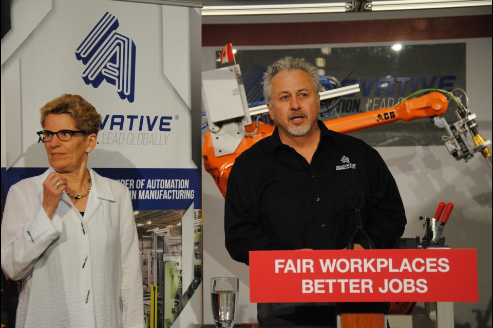 Innovative Automation's Steve Loftus tells the media why his company chooses to pay  $17 per hour, $5.60 more than minimum wage. He supports the province's plan to increase the minimum wage. Laurie Watt for BarrieToday