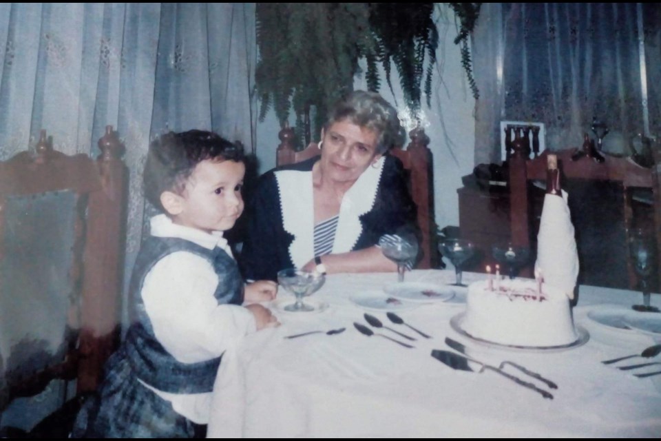 A young Sergio Morales, who's now a Barrie city councillor, is shown with his grandma, Fanny Solorzano, during a family celebration in this undated photo. Photo submitted