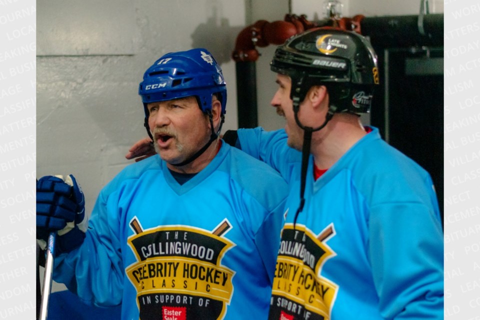 Former Toronto Maple Leafs captain Wendel Clark (left) is shown in a file photo.