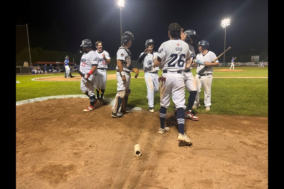 The Barrie Baycats celebrate a run scored in Game 3 of the Intercounty Baseball League championship series on Thursday night at Vintage Throne Stadium. The Baycats beat the Guelph Royals, 6-1, to take a 3-0 lead in the best-of-seven series. 