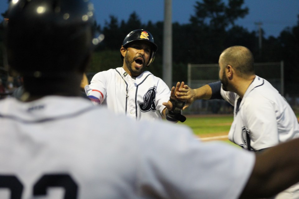 Barrie Baycats third-baseman scores, Tuesday night in Game 5 of the Intercounty Baseball League final at Coates Stadium in Midhurst. Raymond Bowe/BarrieToday