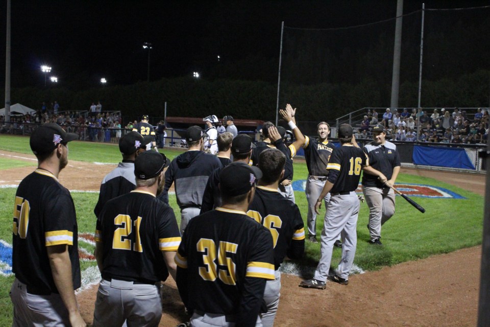 The Kitchener Panthers celebrate after Brian Burton scored the only run of the game to open the Intercounty Baseball League final at Coates Stadium in Midhurst. The Panthers defeated the Barrie Baycats, 1-0, to take a 1-0 lead in the best-of-seven series. Raymond Bowe/BarrieToday