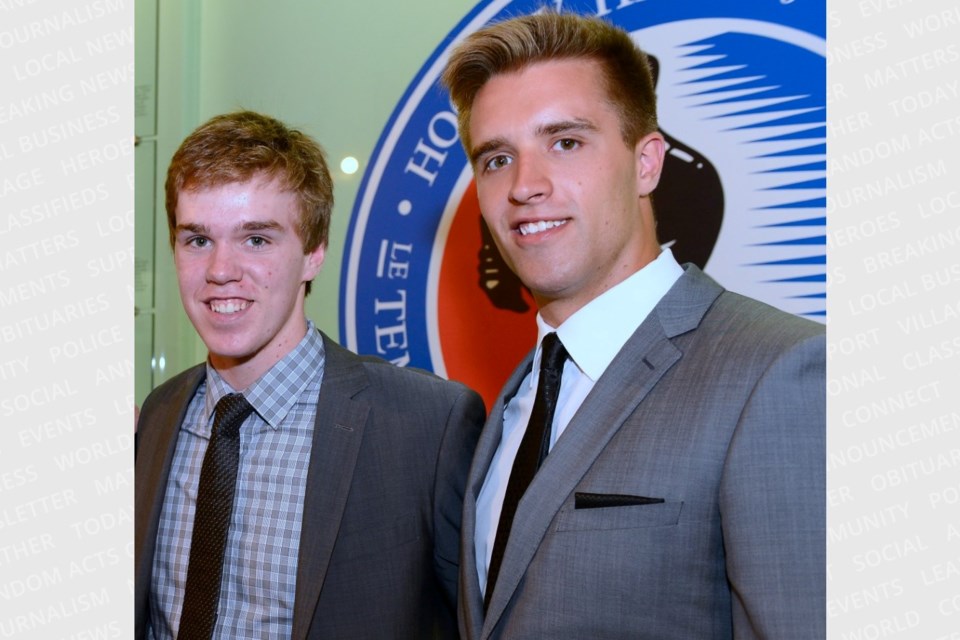 Edmonton Oilers captain Connor McDavid, left, then of the Erie Otters, and Florida Panthers defenceman Aaron Ekblad, then of the Barrie Colts, are shown in this file photo at the 2013-14 OHL Awards ceremony at the Hockey Hall of Fame in Toronto.