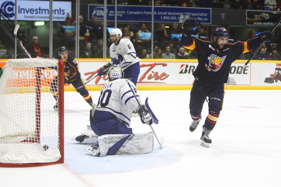 The Barrie Colts celebrate a third period goal as they skated to a 5-2 game 5 victory over the Mississauga Steelheads at the Barrie Molson Centre on Saturday, March 31, 2018. Kevin Lamb for BarrieToday.