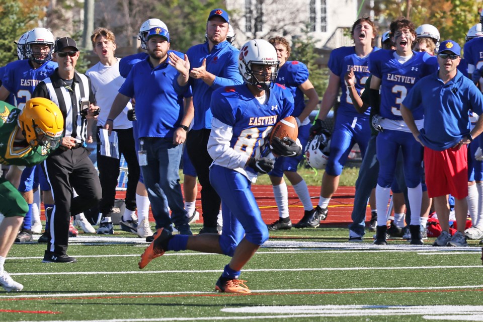 An Eastview Wildcats player runs the ball up the field during their game against the Barrie North Vikings during the inaugural Football Festival held at Maple Ridge Seccondary School in Barrie's soyh end. The Vikings won, 16-6. The games, four in total throughout the day, also served as a fundraiser and drop-off point for the Barrie Food Bank. 