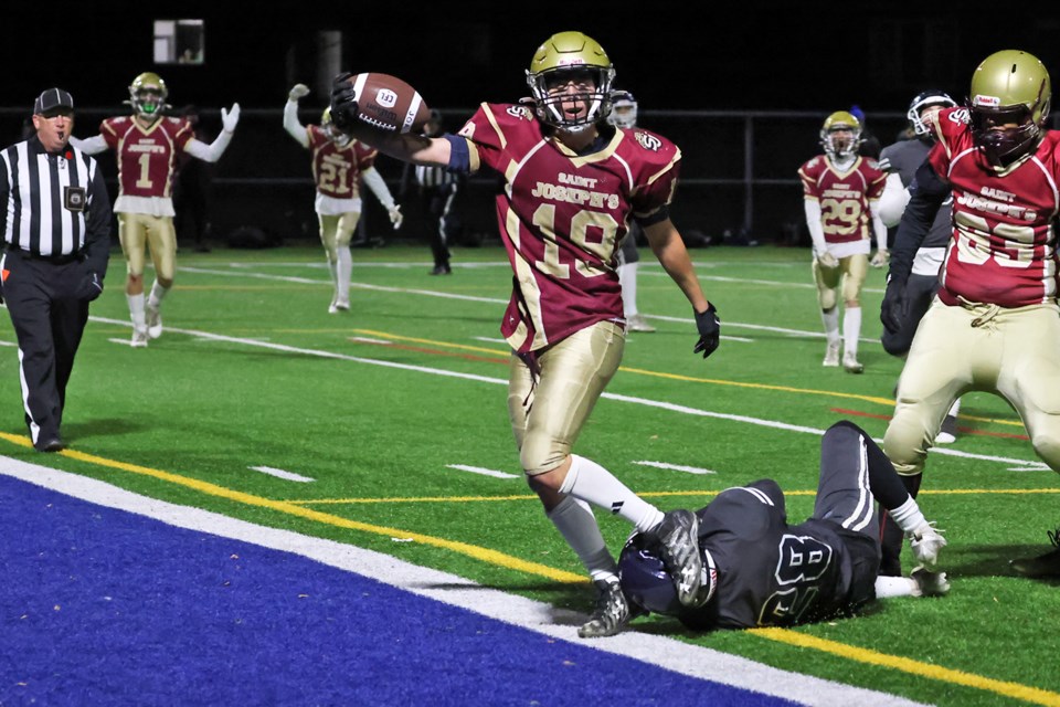 The St. Joseph's Jaguars score the winning touchdown during their 21-14 win over St. Joan of Arc Knights in the Catholic School Athletics of Simcoe County (CSASC) senior championship game at J.C. Massie Field at Georgian College in Barrie on Friday night. They’ll now face Barrie North on Nov. 14 for the Georgian Bay championship. 