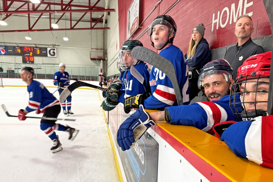 Players make a line change during the Mind to Muscle Cup at the Allandale Recreation Centre in Barrie on Tuesday evening. The charity hockey event was in support of the Barrie Food Bank.