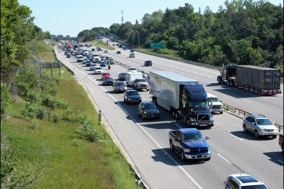 Southbound Highway 400 traffic slowed to a crawl near the Bayfield Street on Monday at about 10:30 a.m., following unconfirmed reports of a vehicle crashing into the guard rail. Jessica Owen/BarrieToday