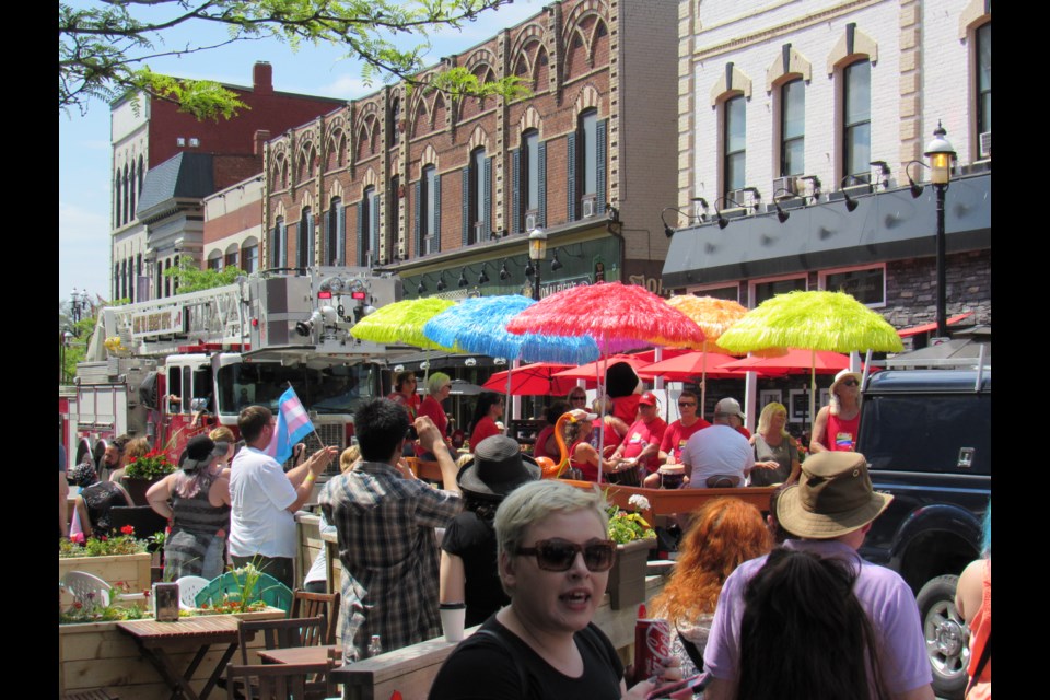 Hundreds of people lined parade route streets, including Dunlop Street for the 2017 Barrie Pride Parade. Shawn Gibson for BarrieToday