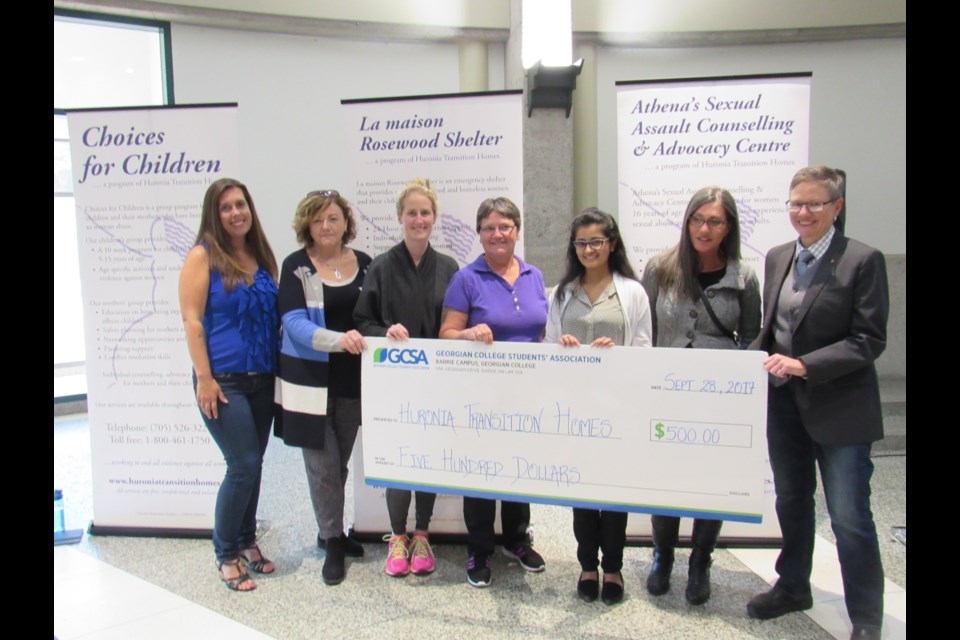 Take Back The Night 2017
Huronia Transition Homes receives a cheque from the Georgian College Students Association
photo credit Shawn Gibson                               