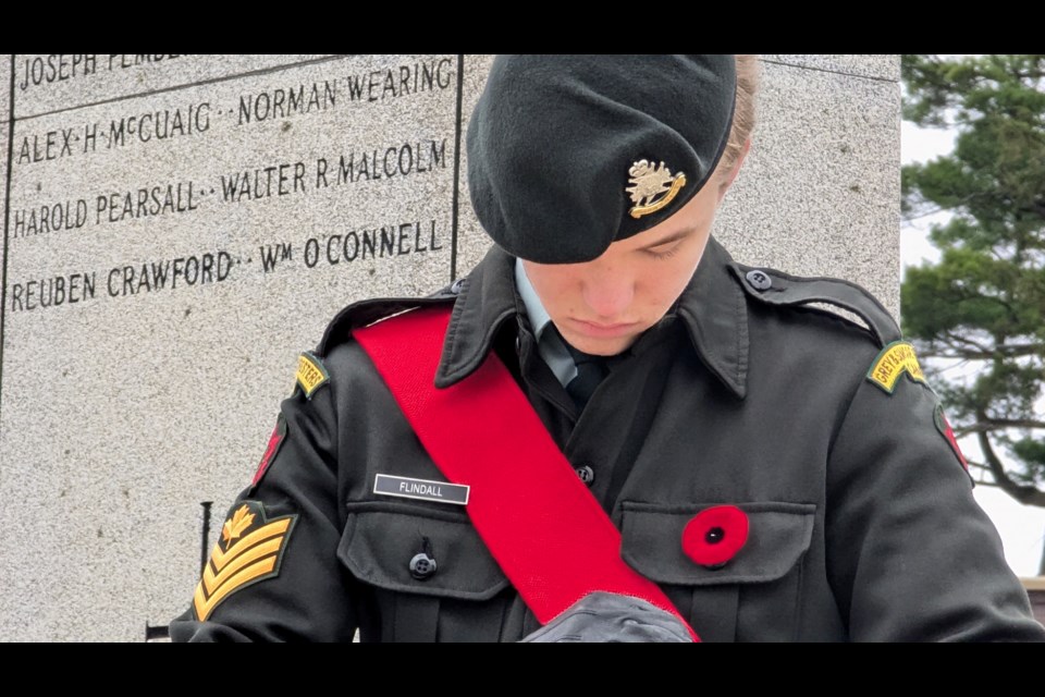 A member of the Grey and Simcoe Foresters stands guard at the Old Town Hall cenotaph during the Oro-Medonte Remembrance Day service held Sunday morning.