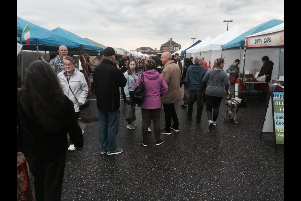 The last day of the North Bay Farmer's Market was busy but wet