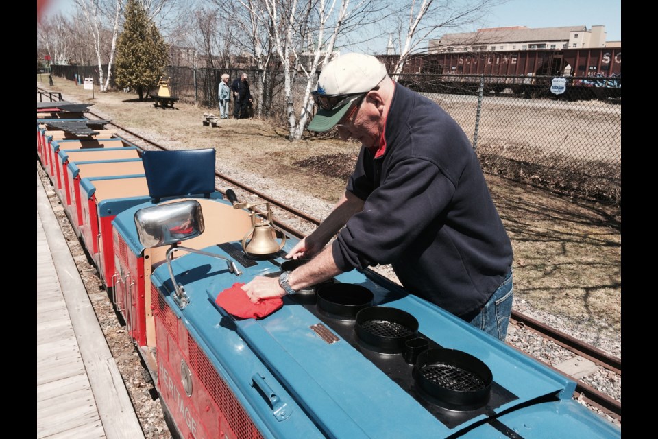 Volunteer Bill White shines up the heritage train for the start of the season 