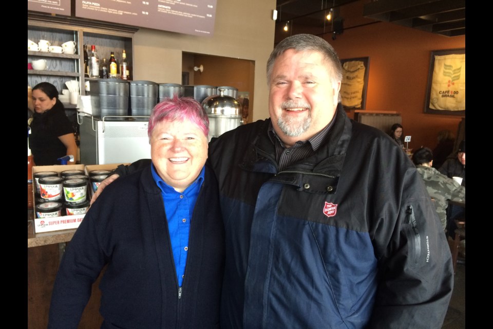 Major Bonita McGory of the  Salvation Army and John Dobbs Director of Program Services kick off this year's Christmas Kettle Campaign 