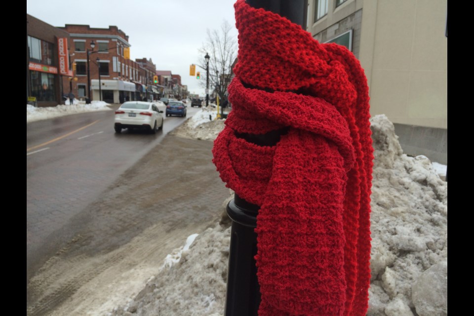 Red Scarf Project makes its way onto Main Street North Bay during World AIDS Day celebrations