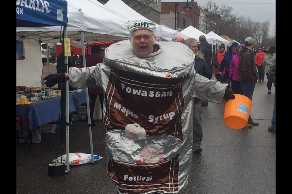 Sappy the Powassan Maple Syrup mascot greets festival goers 