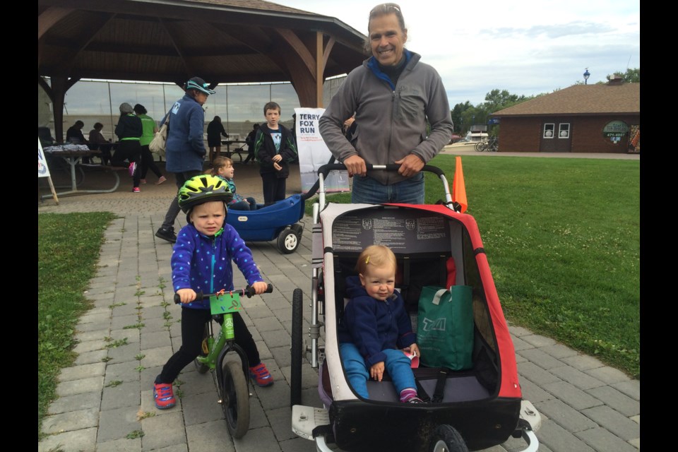 Cancer survivor John Fisher and his grandchildren raise money for the Terry Fox Foundation 