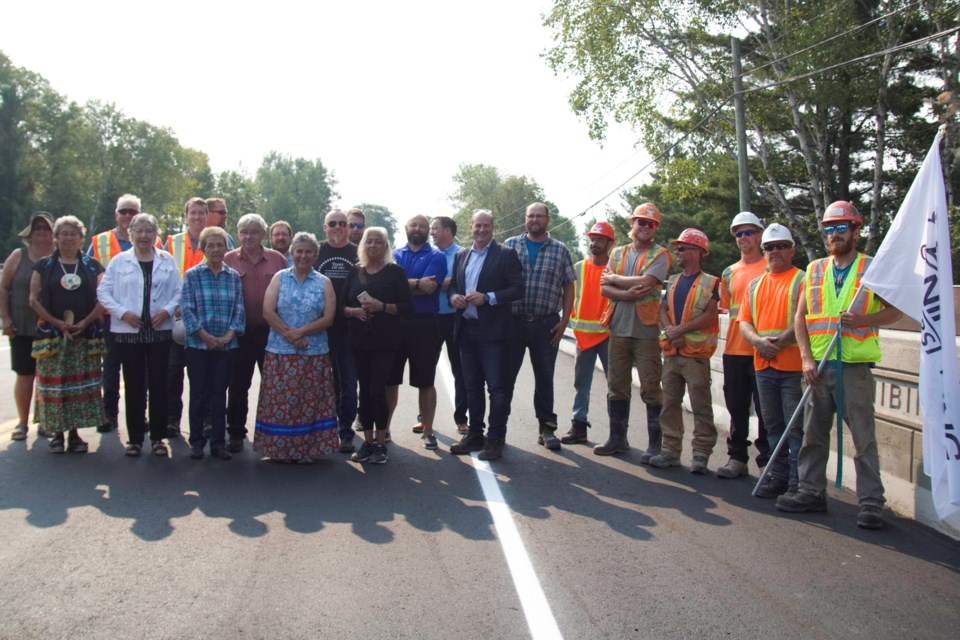 Nipissing First Nation's chief and council, representatives from Miller, and members of the work crew gather to celebrate the opening / Photo David Briggs