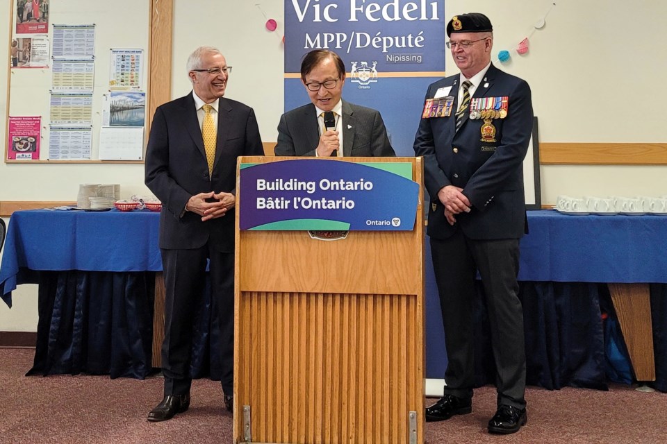 Vic Fedeli, Minister Raymond Cho, and Legion Branch 445 President Richard Rhindress gather to hear of the province's funding announcement for seniors