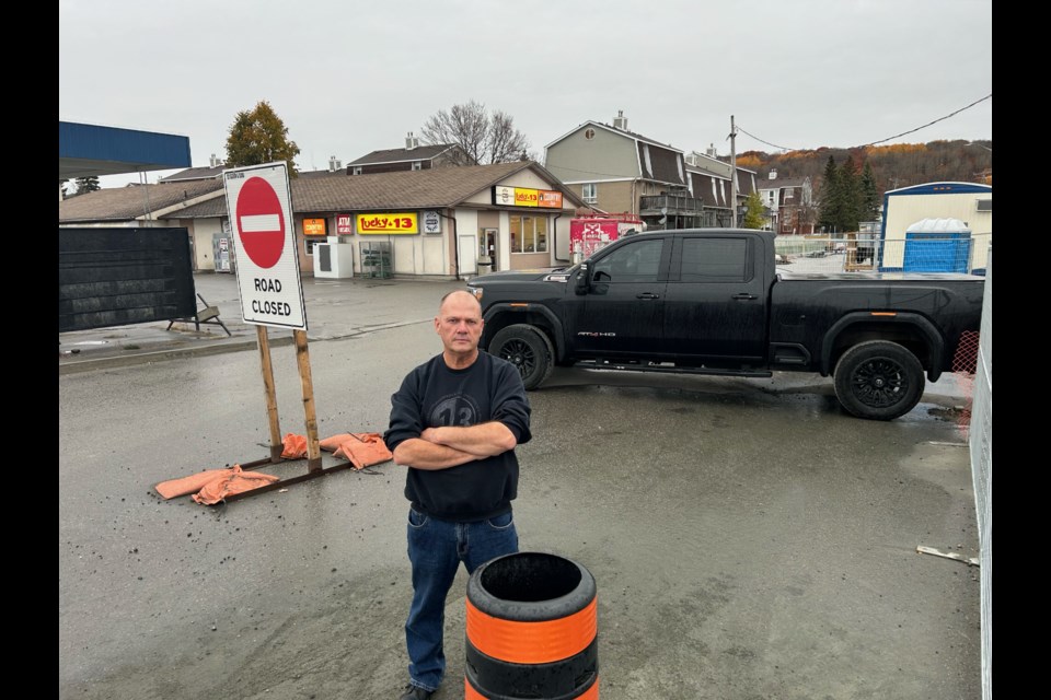 Ray Seguin, owner of Lucky 13 on McKeown Avenue stands near all the construction surrounding his convenience store and gas bar. 