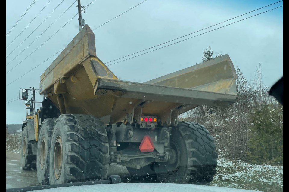 Rock truck driver faces numerous charges.