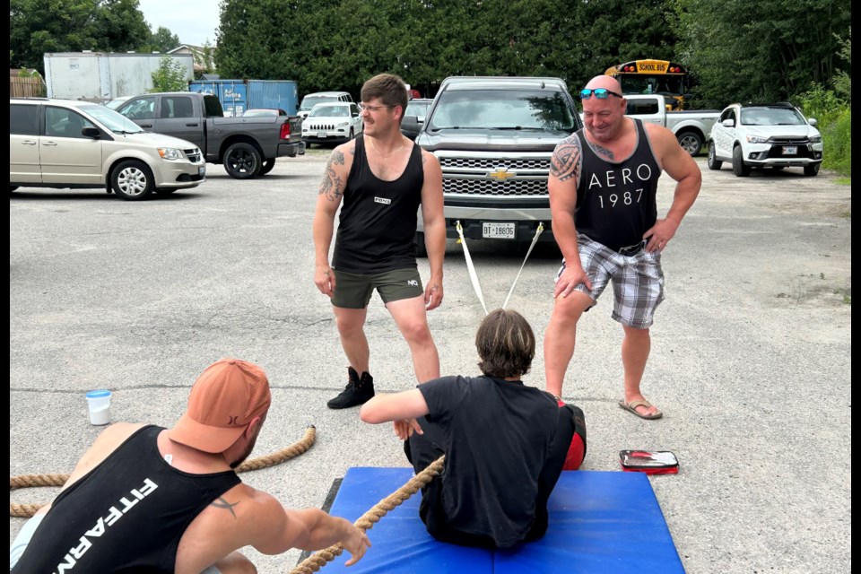 There was a chance to show your strength by pulling a pickup truck