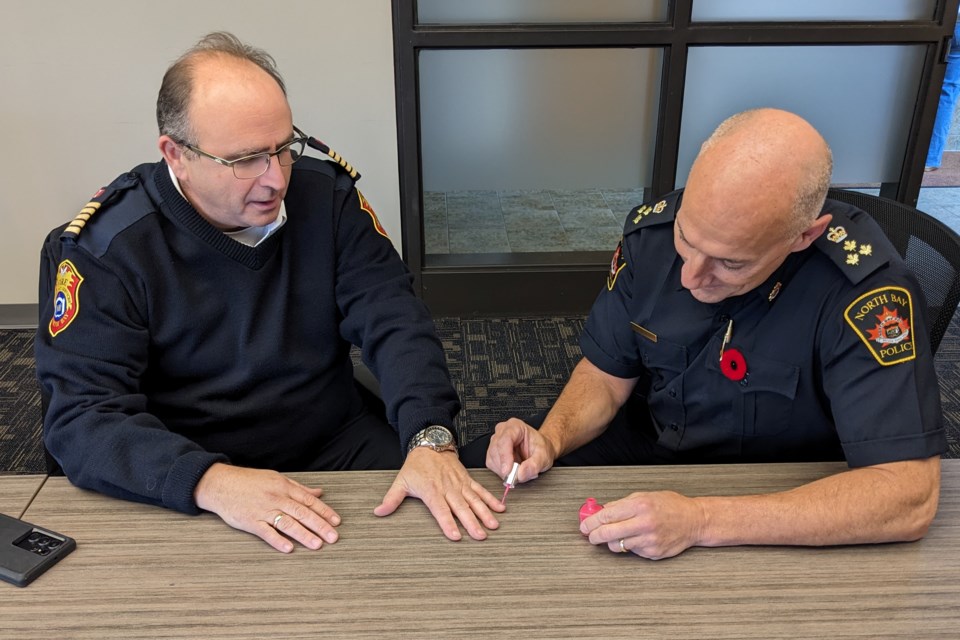 2024-11-01-pink-nails-run-for-the-cure-chief-whiteley-and-chief-longworth-supplied