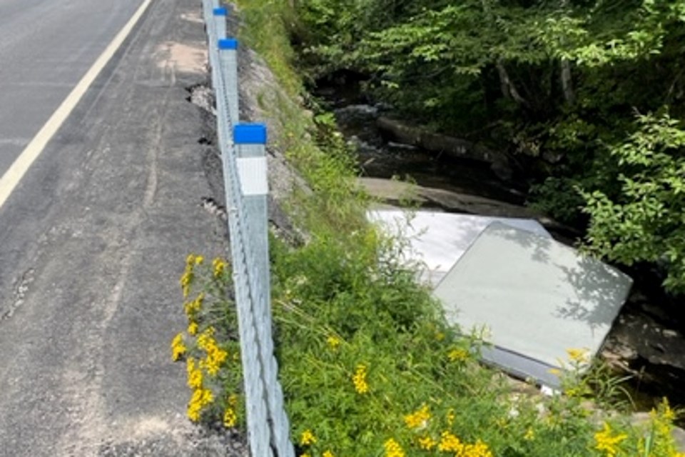 Mattress in the creek off Lees Road.