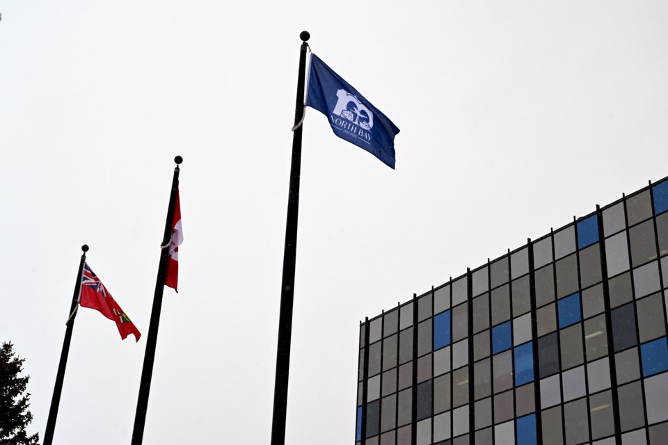 The Centennial flag was raised Thursday afternoon in Leger Square.