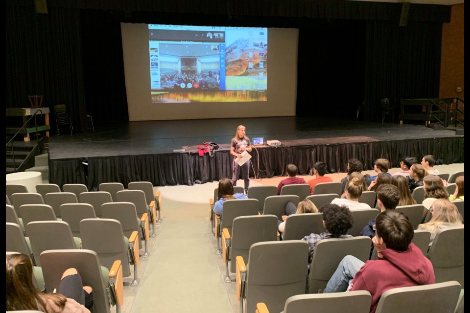 West Ferris teacher Kelly Shulman addresses students in the auditorium. Bob Coles/CKAT.