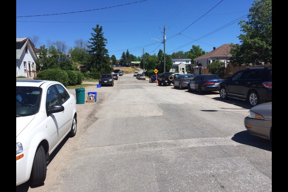 Parking can be hard to find on Stones Street, off High Street, when school starts and stops. School buses add to the problem say residents. Photo by Jeff Turl.