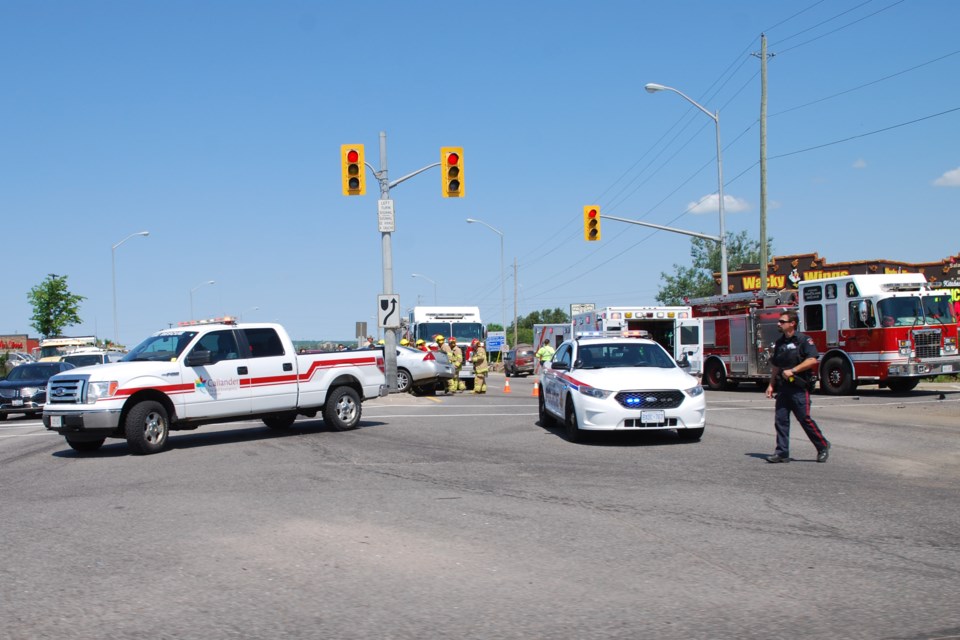 Two vehicle crash has one driver rushed to hospital. 