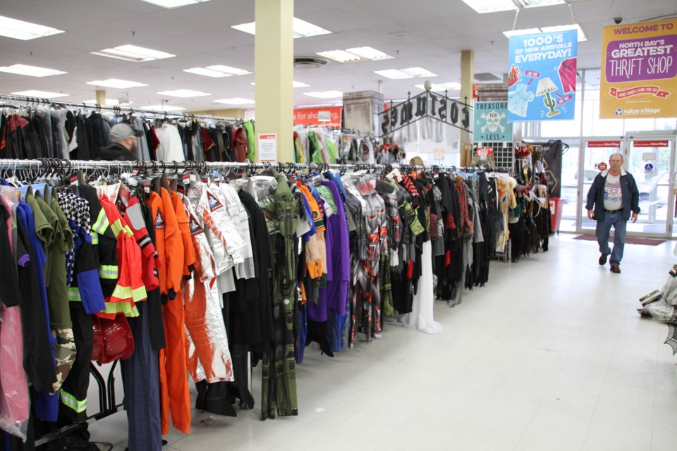 Rows and rows of costumes. Photo by Hannah Knight. 