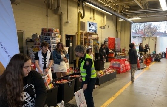 Volunteers prepare for the excited kids at the fire department.