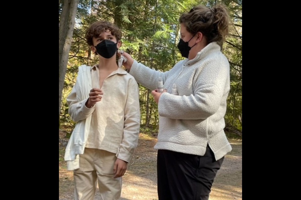 Kim Bean applying SPFX dirt to actor Jett Klyne, who plays Holocaust survivor, Maxwell Smart, in The Boy in the Woods.