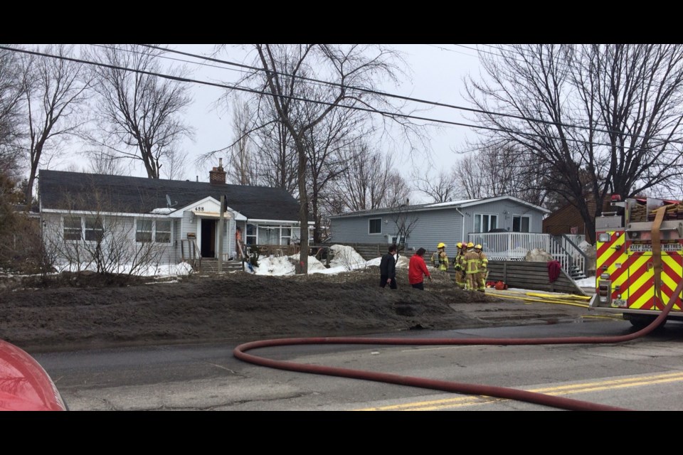 This house fire caused Lakeshore Drive to be closed to traffic in both directions this afternoon. Photo by Jeff Turl.