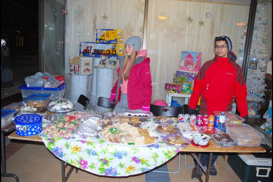 St. Joseph Scollard Hall students Raiah Patterson and Nico Gactua were selling baked goods outside Creative Learning.  The money raised will help fund a working trip for local students to help out in Costa Rica.  As part of the Duke of Edinburgh program, the students will work towards funding education and finishing schools that the program helped build.  The trip is planned for August.  