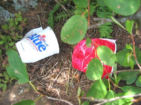 Careless campers leave plastic beer cups behind. Photo by Phil Novak.